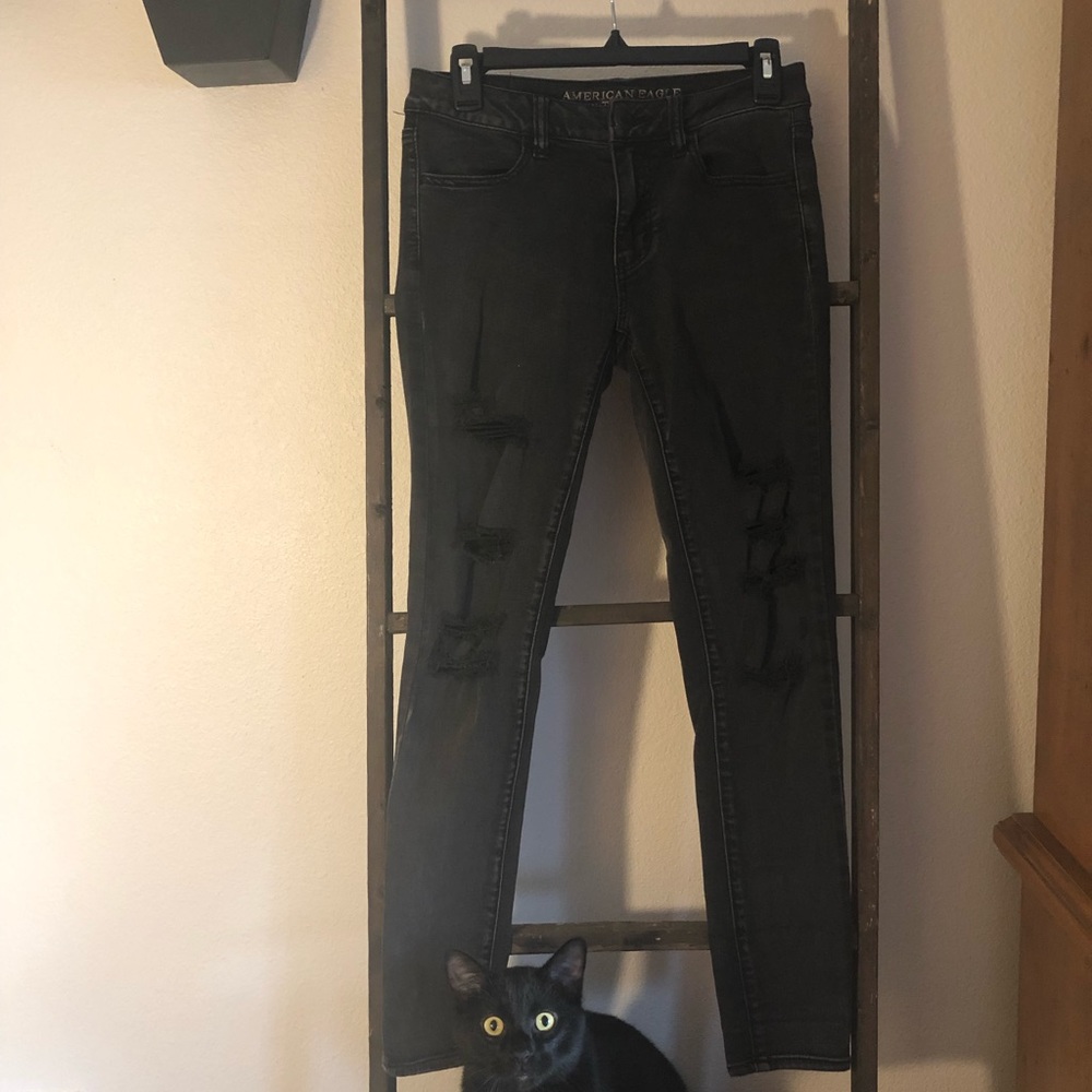 Faded black ripped skinny jeans